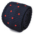 navy blue skinny knitted tie with red polka dots design